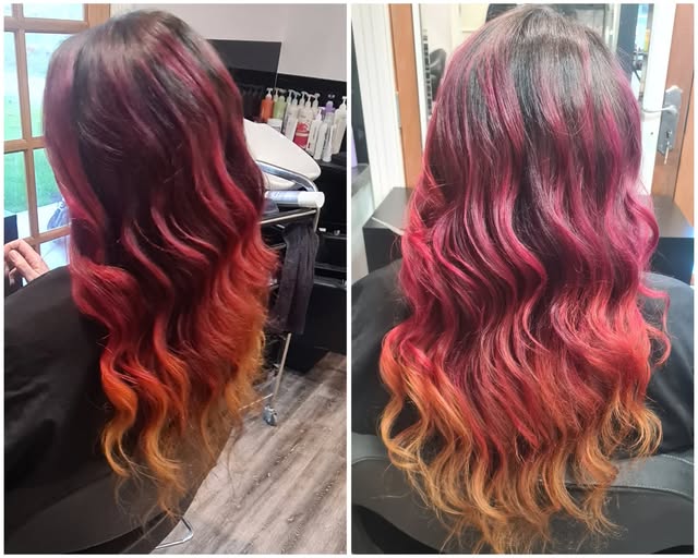Before and after of a magenta to orange colour melt on long waved hair