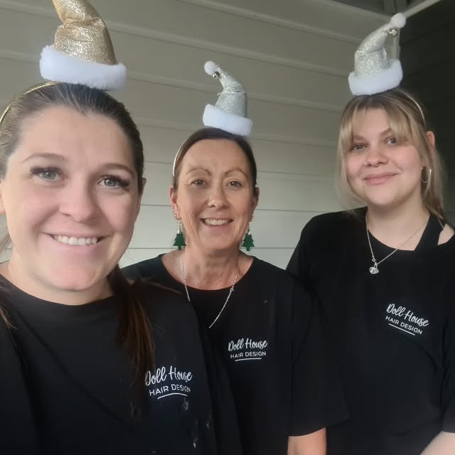 Tahnee Rowe and the team at Doll House Hair Design in branded shirts